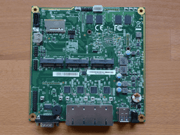 APU4B4 board on a wooden surface (front side).