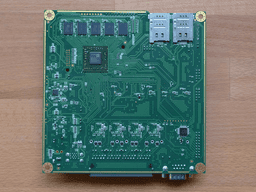APU4B4 board on a wooden surface (back side).